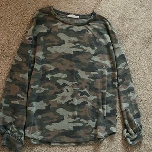 Women’s long sleeve camo top.